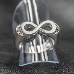 Infinity ring with white stones