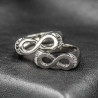 Infinity ring with white stones