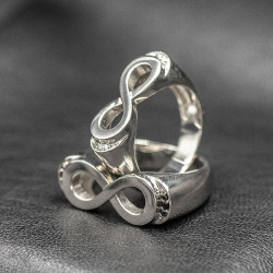 Infinity ring with white stones